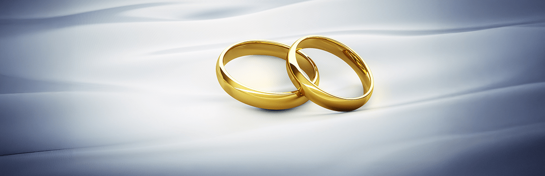 Gold wedding bands symbolizing how prenuptial agreements can serve as powerful estate planning tools to protect assets and support long-term financial goals.